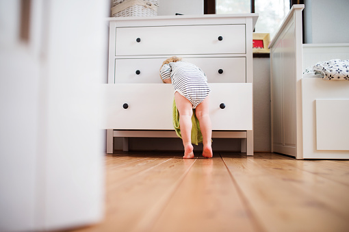 Baby in an open drawer