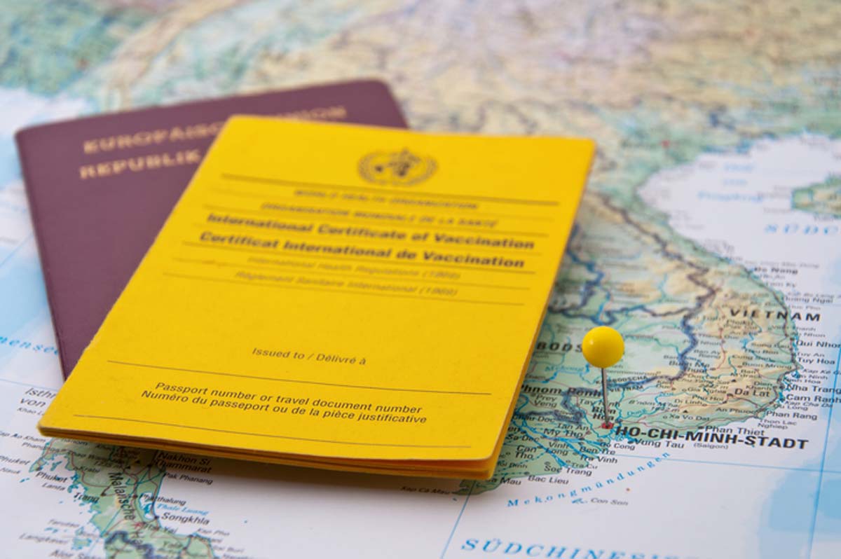 passport-and-vaccination-certificate-on-a-map