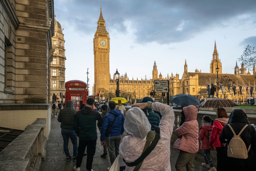 Crowds of people taking photos of Big Ben