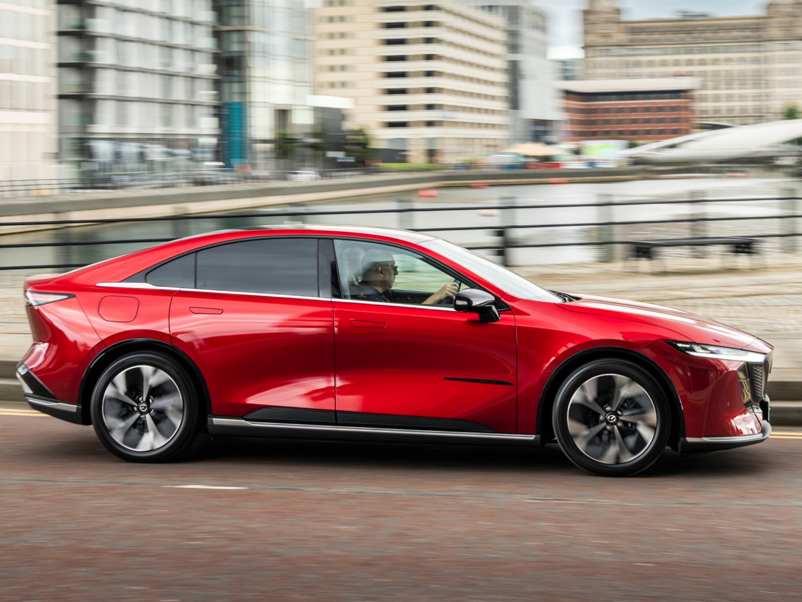 A red Mazda 6e car