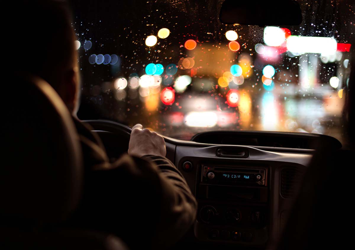 driver-in-the-car-at-night