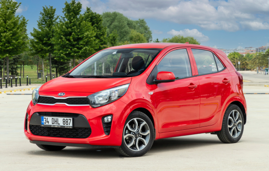 red kia picanto parked