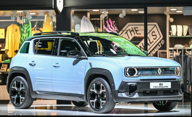 blue renault r4 etech in shopping mall
