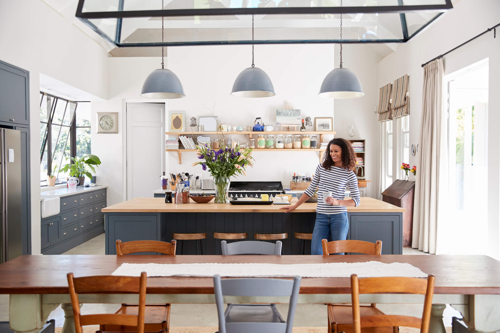 woman in open plan kitchen