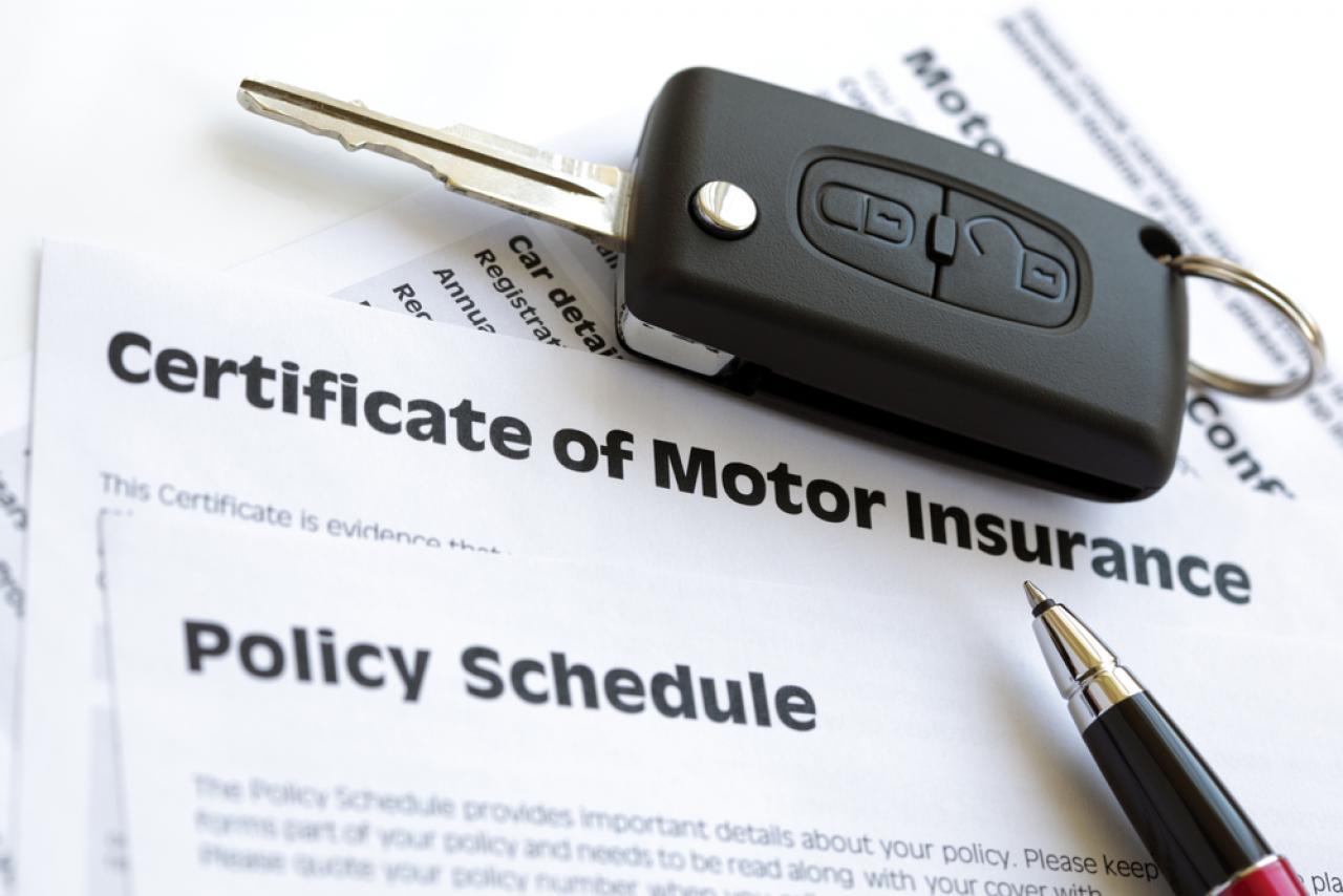 Insurance documents and car key