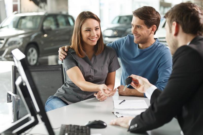 a-couple-buying-a-new-car