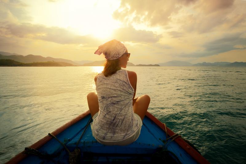 woman-sitting-on-a-boat