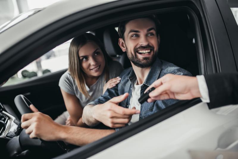 young-couple-buying-a-new-car