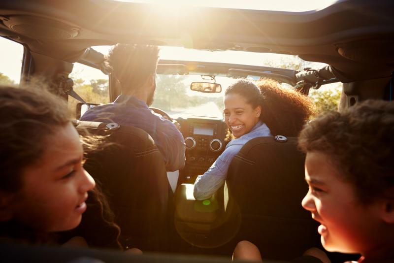 family-in-their-car-on-a-road-trip