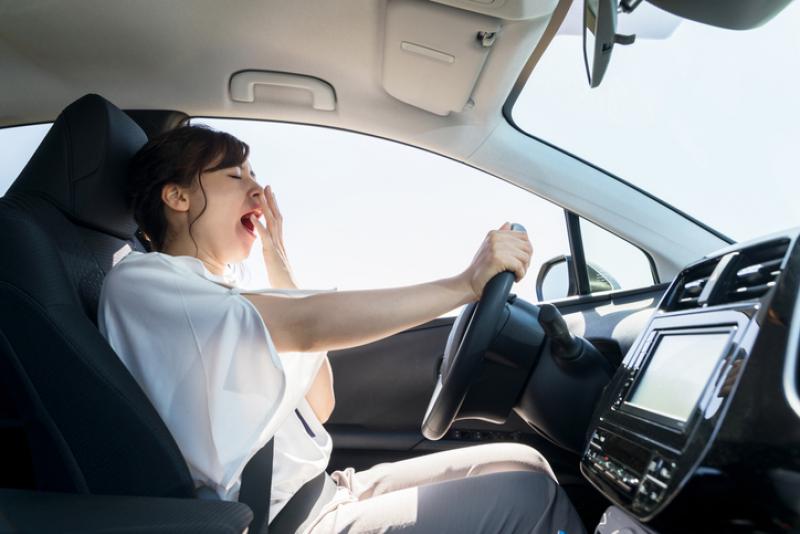 female-driver-yawning