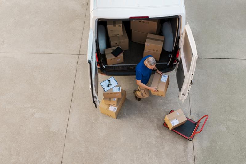 man unloading a van