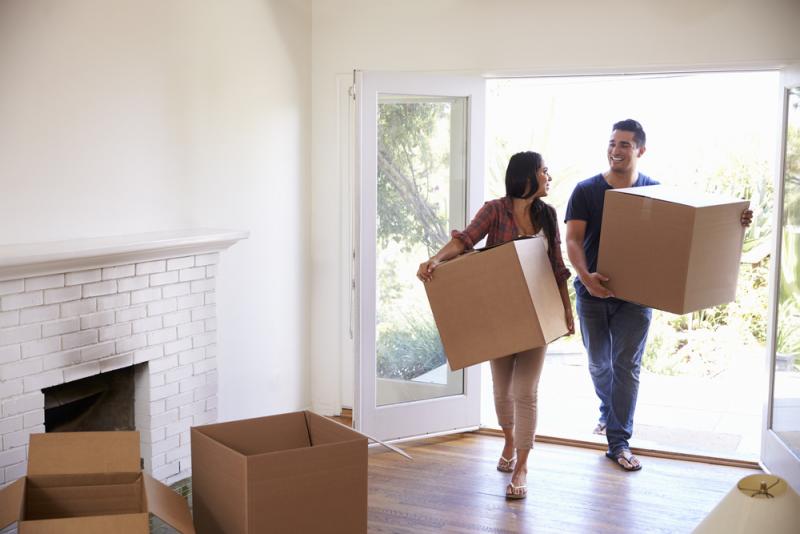 young couple moving into new home