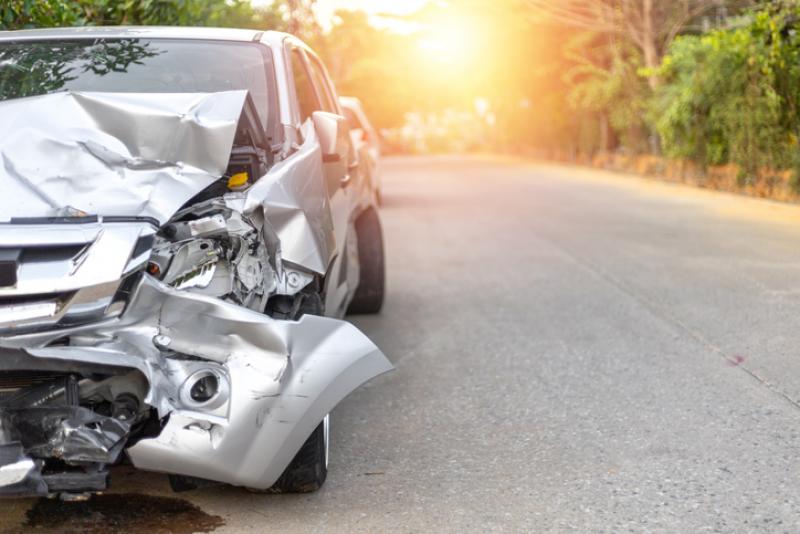 silver car damaged after crash