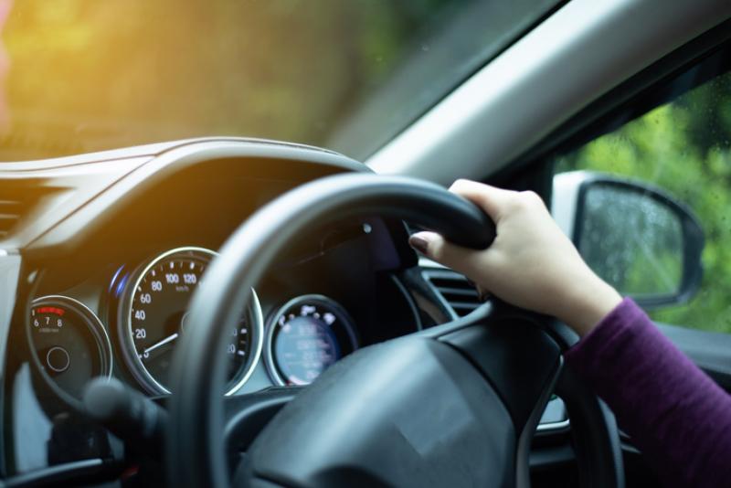 hands on a steering wheel