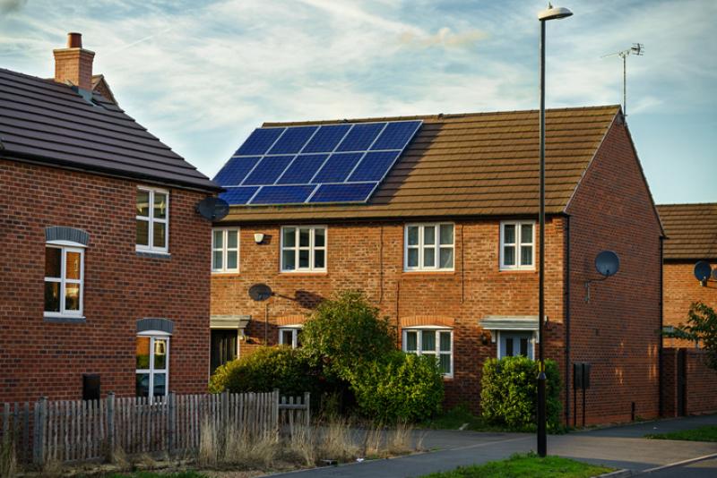 Solar photovoltaic panels on a house roof