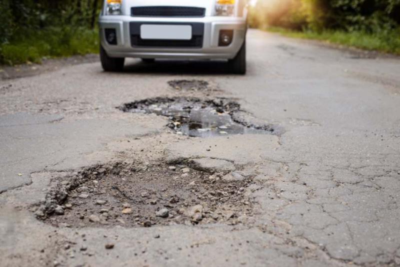 pothole in road