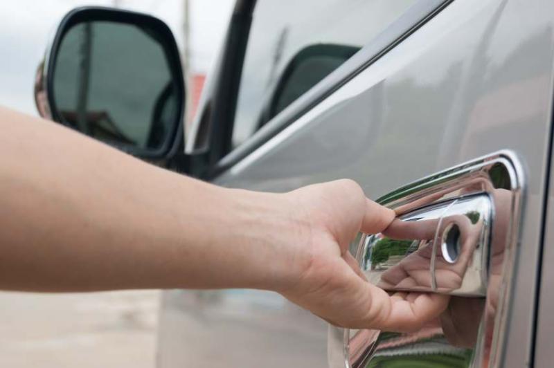 Image of a van lock on a grey van.