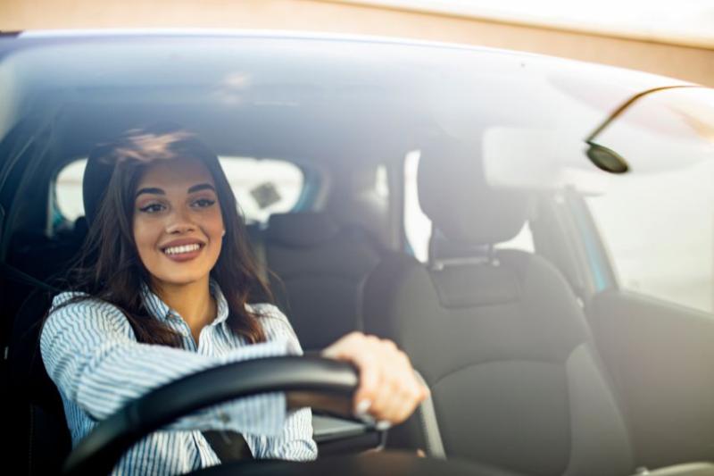 A woman driving a car