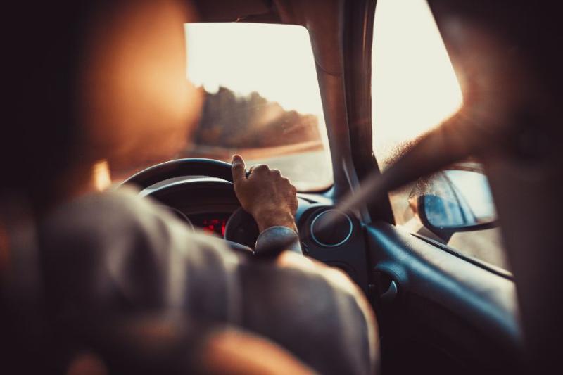 View over someone's shoulder driving
