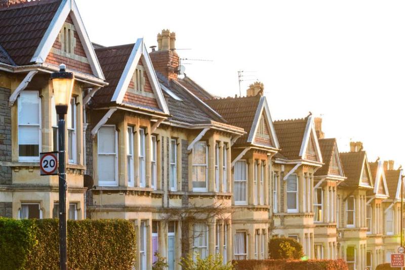 row of terraced houses at sunset