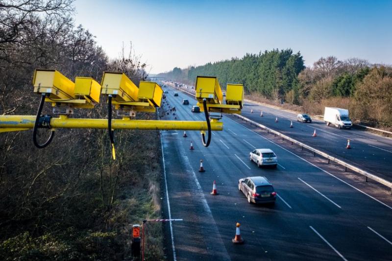 Speed cameras looking over a busy UK motorway