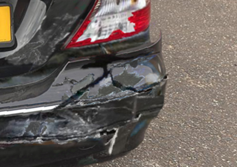 Bumper of a black car that has been digitally altered 