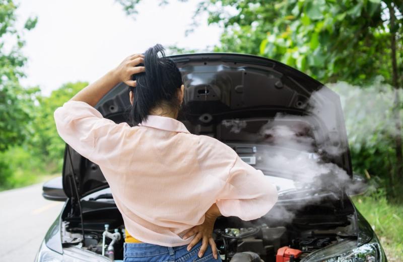 Image of smoke emerging from a car engine