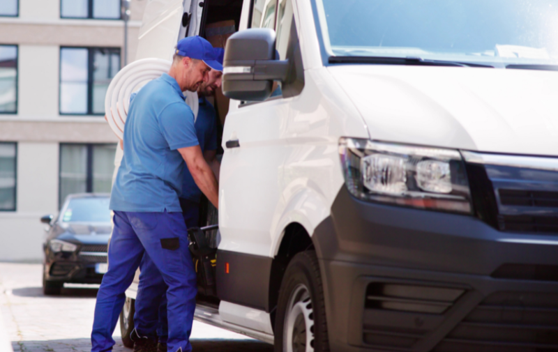 men unloading a van