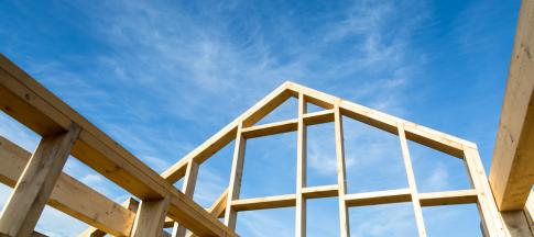 a-timber-framed-building-being-built