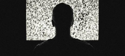 ghost-broker-scam-man-in-shadows