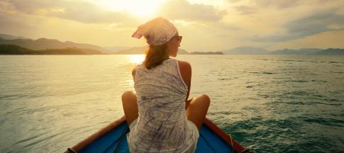 woman-sitting-on-a-boat