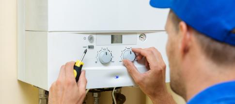 boiler-technician-fixing-a-boiler