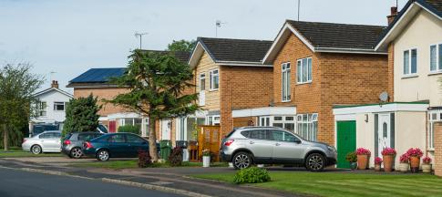 cars-parked-outside-houses