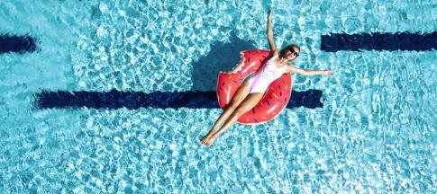 woman-in-pool-on-inflatable-ring