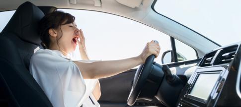 female-driver-yawning
