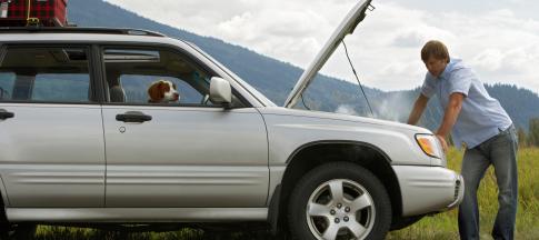 broken-down-car-on-grass-verge