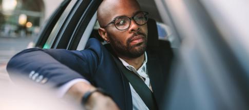 man-in-car-driving-to-work