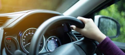 hands on a steering wheel