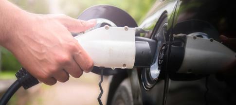 Electric vehicle charging plug