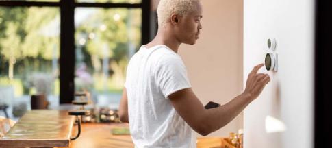 Image of a man using a smart meter