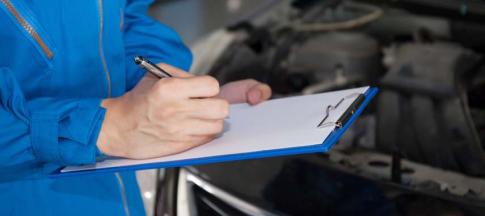 Image of a mechanic performing an MOT