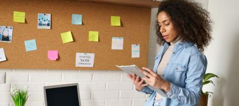 Image of a woman ticking off a checklist