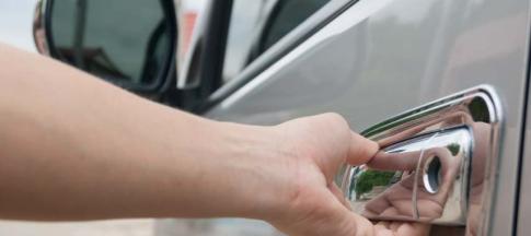 Image of a van lock on a grey van.