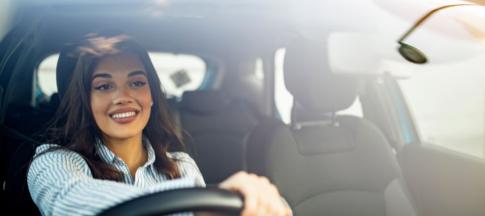 A woman driving a car 