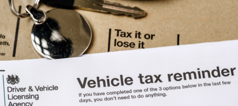 car tax reminder letter next to car keys