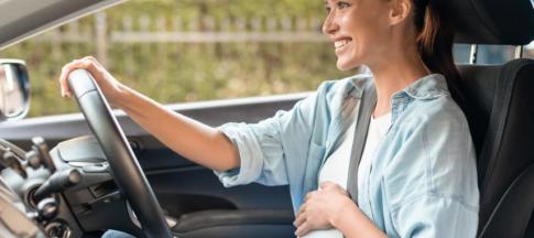 A pregnant woman driving