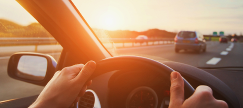 Woman drives a car in Europe