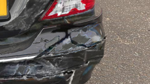 Bumper of a black car that has been digitally altered 