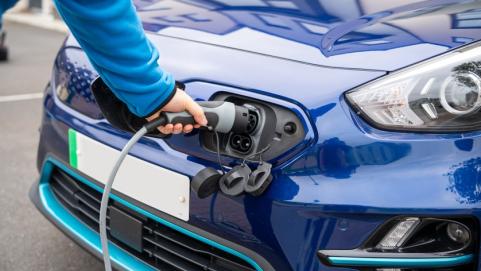 Electric car being charged