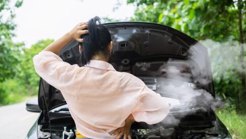 Image of smoke emerging from a car engine